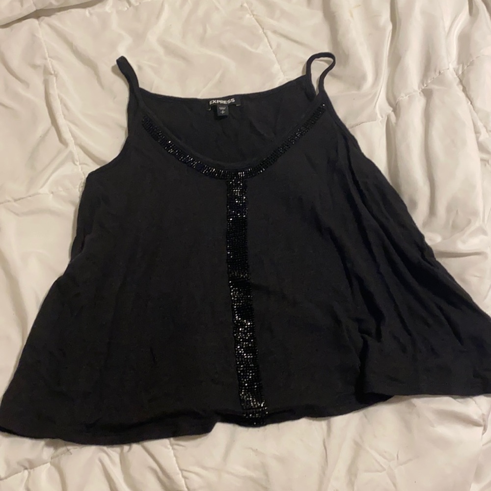 Size small tank. Worn twice